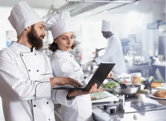 Chef with digital recipe screen